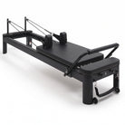 Pilates reformer aluminum all black, 3/4 view
