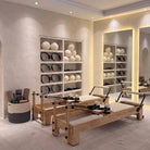 Pilates reformer Classic milky white, in a studio