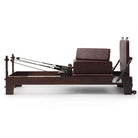 Pilates reformer Prestige wine, side view with sitting box